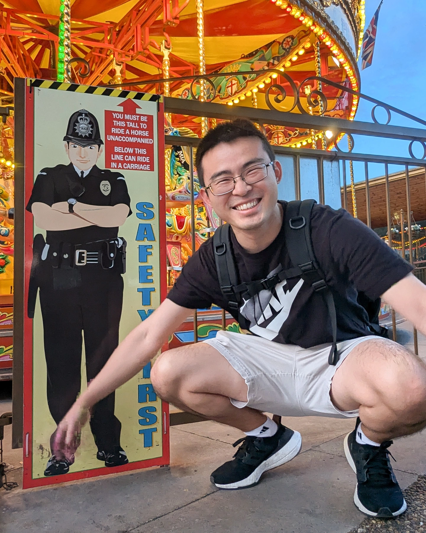 Before: Crouching at a fair next to a height check sign. Fun energy, wrong photo.